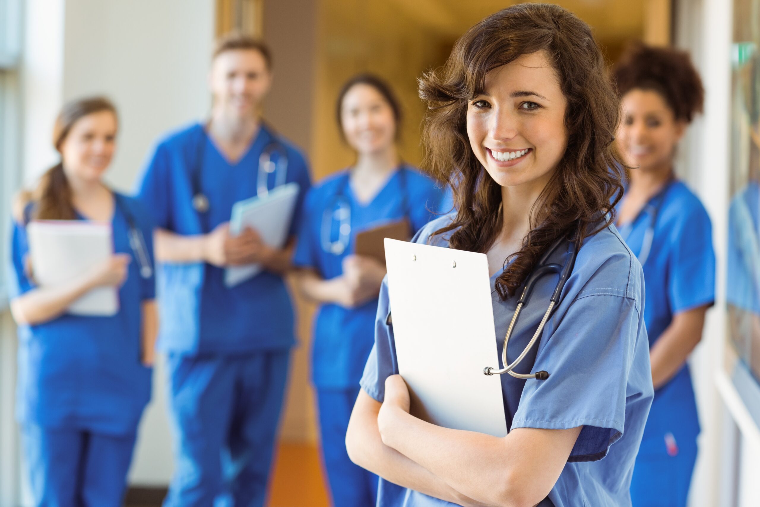 medical students smiling at the camera